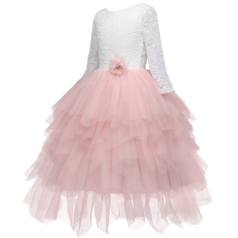 Detail of the sweet ruffles on the skirt of a girls' backless lace special occasion dress.