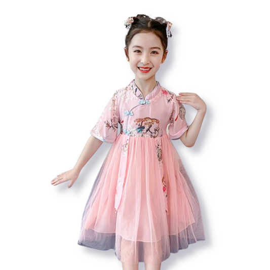 Elegant girls' cheongsam dress featuring a beautiful traditional tree print, perfect for special occasions & cultural wear.