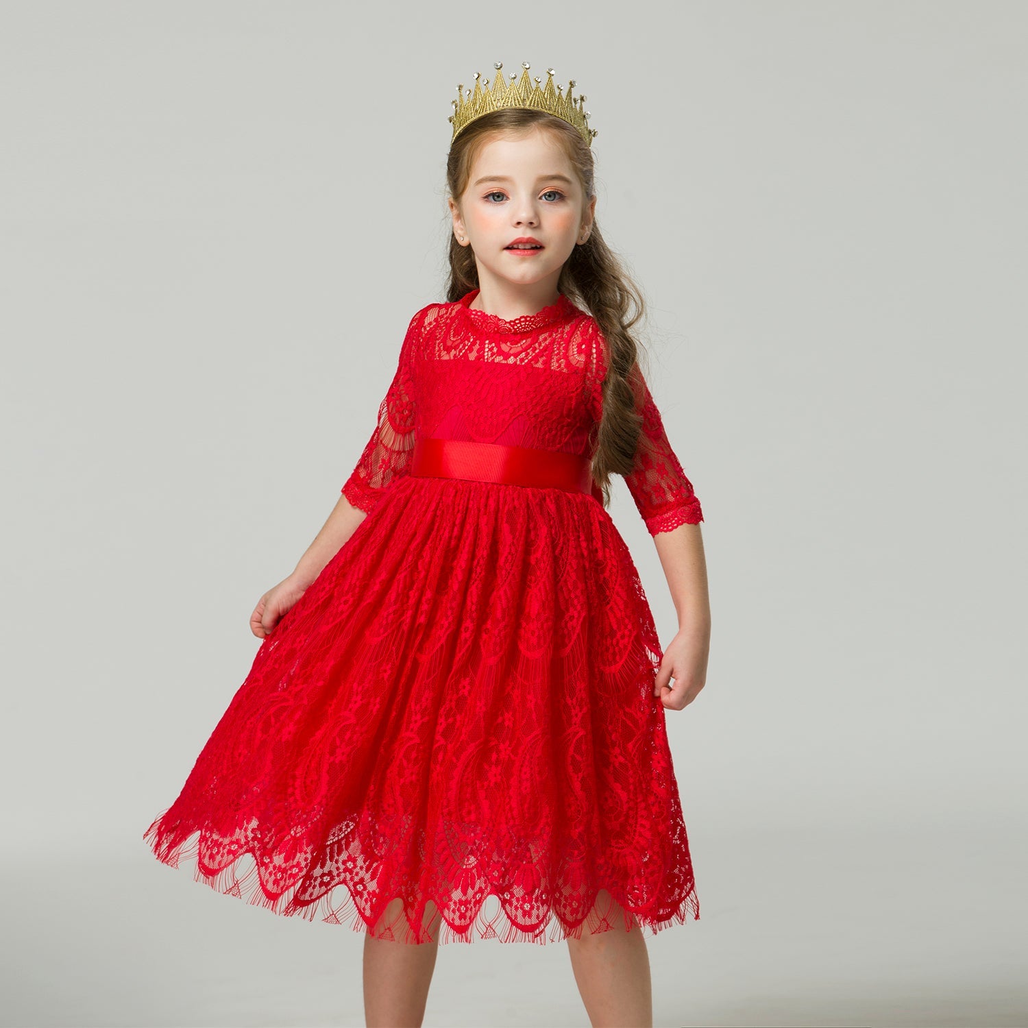Toddler girl in a beautiful long sleeve lace and ribbon dress, ideal for parties