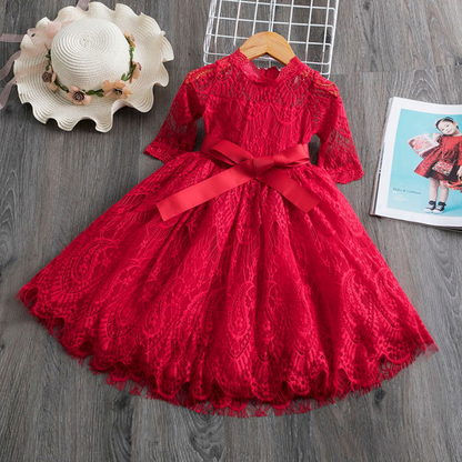 White long sleeve lace and ribbon dress for a little girl, suitable for any celebration