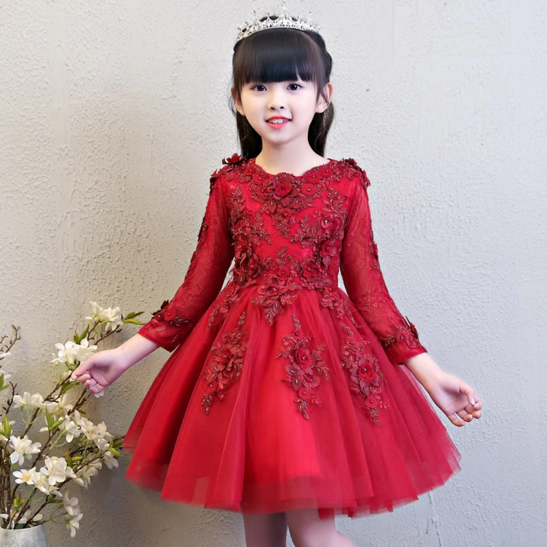 Toddler girl in a white lace floral applique party dress, ideal for weddings or formal celebrations.