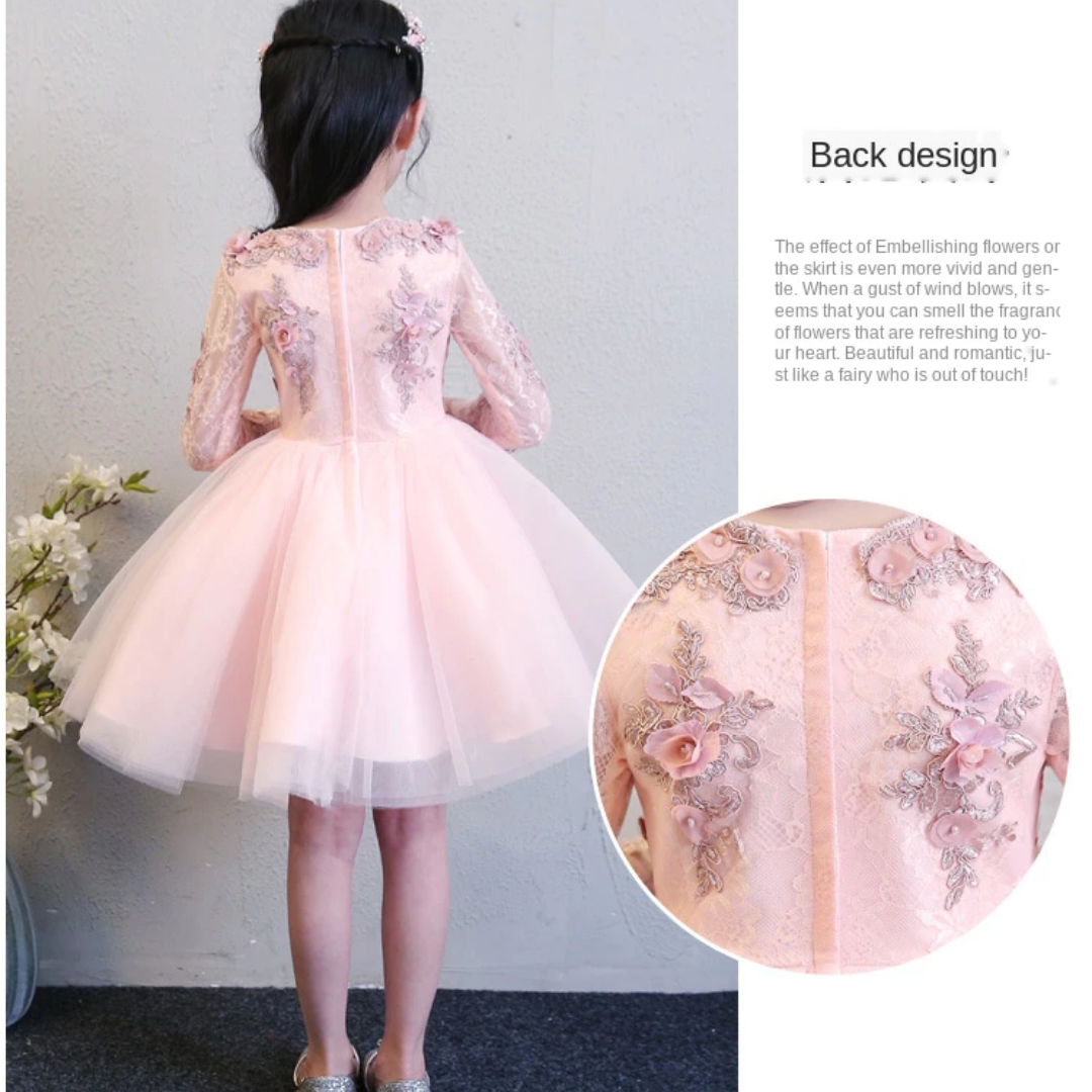 Beautiful girls' special occasion dress with intricate lace floral appliques and a full skirt.