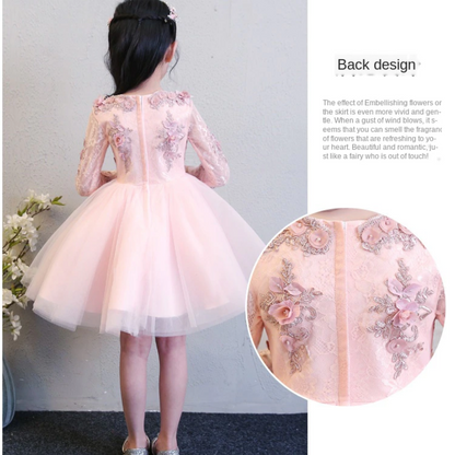 Beautiful girls' special occasion dress with intricate lace floral appliques and a full skirt.