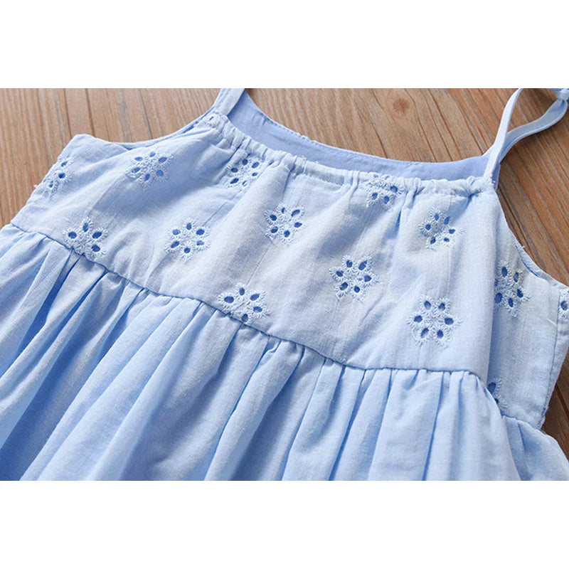 Close-up of the lace and floral print detail on a girls elegant party tutu dress