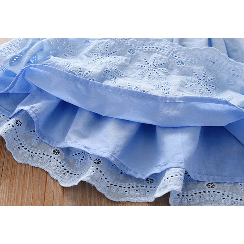 White sleeveless girls tutu dress with subtle floral print and lace, comfortable summer wear