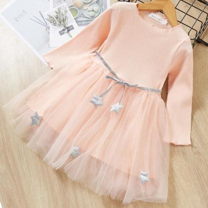 Front view of a beautiful girls' long sleeve star mesh dress, a fashionable kids' cotton attire.
