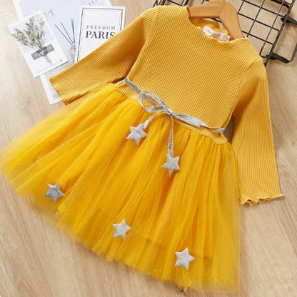 Girls' star mesh long sleeve dress with a full skirt, ideal for special occasions and kids' wear.
