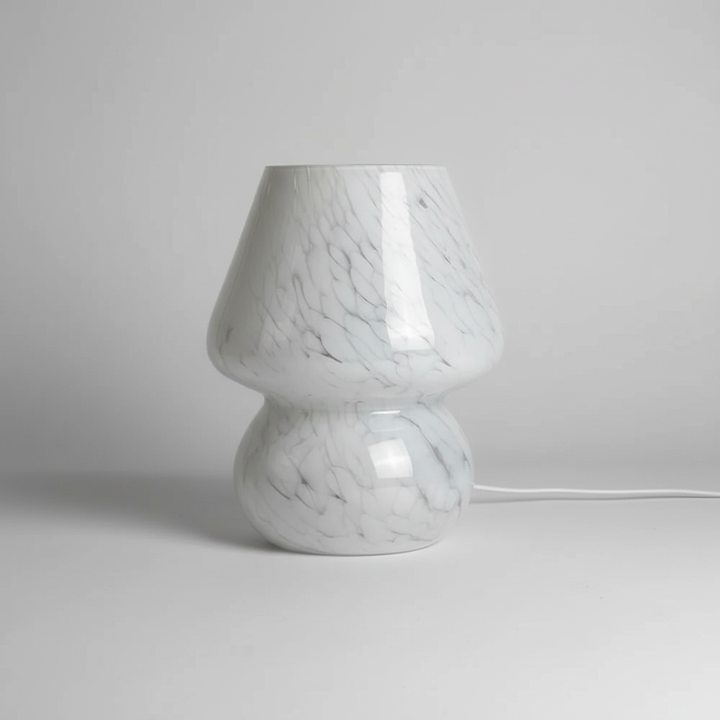 Modern glass mushroom lamp, ideal for cozy bedside lighting or decorative display.
