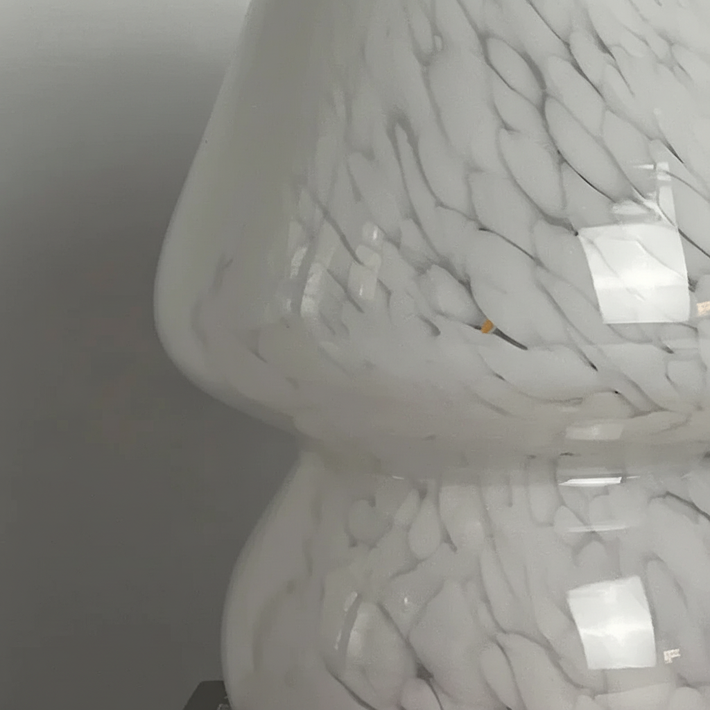 AuraShroom glass mushroom table lamp, providing soft, ambient light for home decor.
