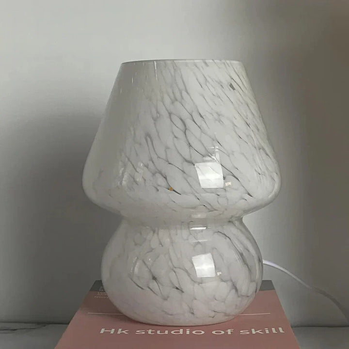 Decorative glass mushroom lamp, adds a unique vintage style touch to living spaces.
