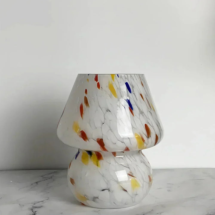 Stylish glass mushroom accent light, perfect for modern bedroom or living room decor.