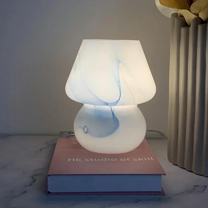 Contemporary glass mushroom lamp, a chic and functional decorative piece for any home.