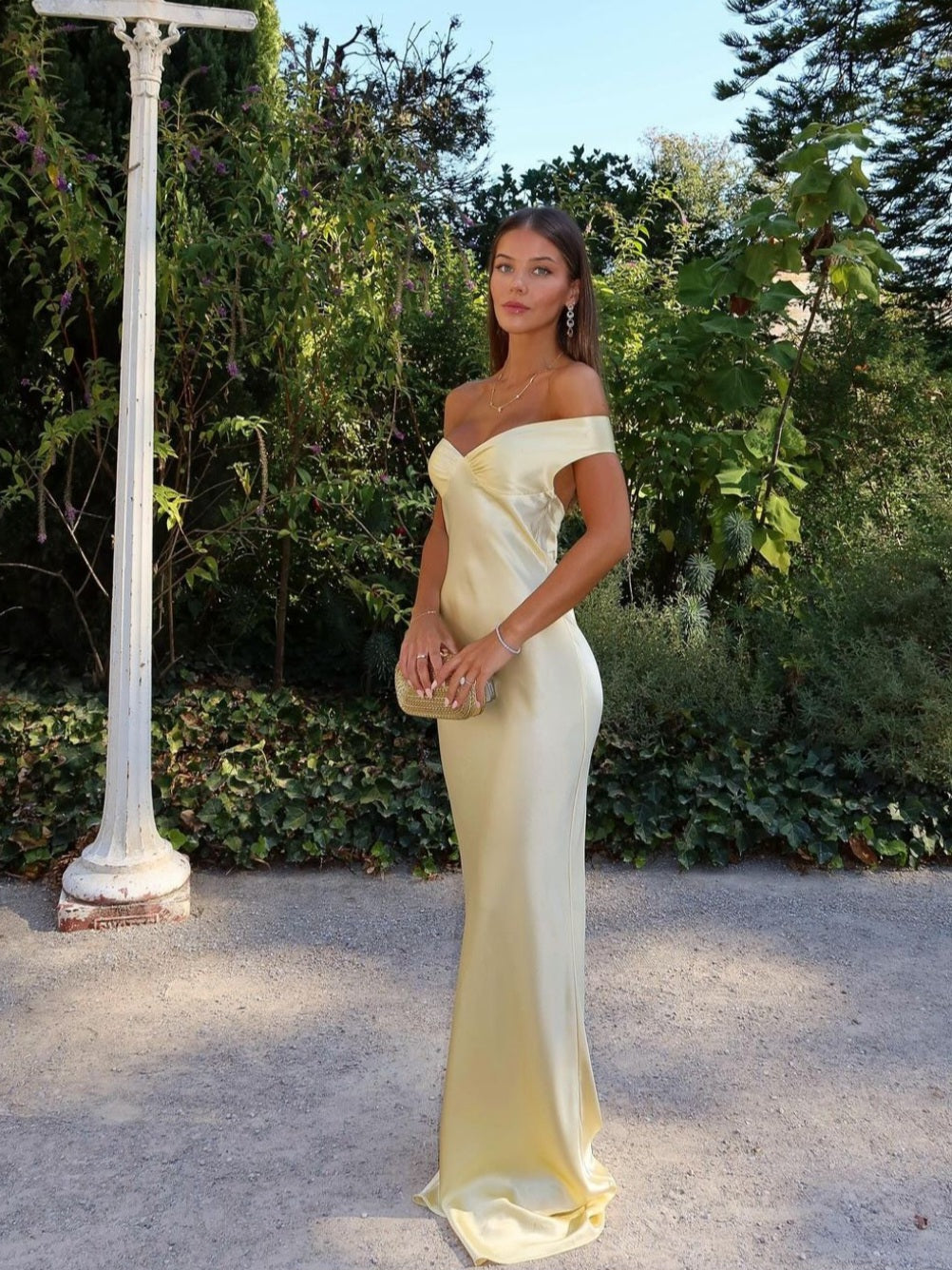 Elegant gold off-shoulder maxi wedding guest dress for women, perfect for formal events & parties.
