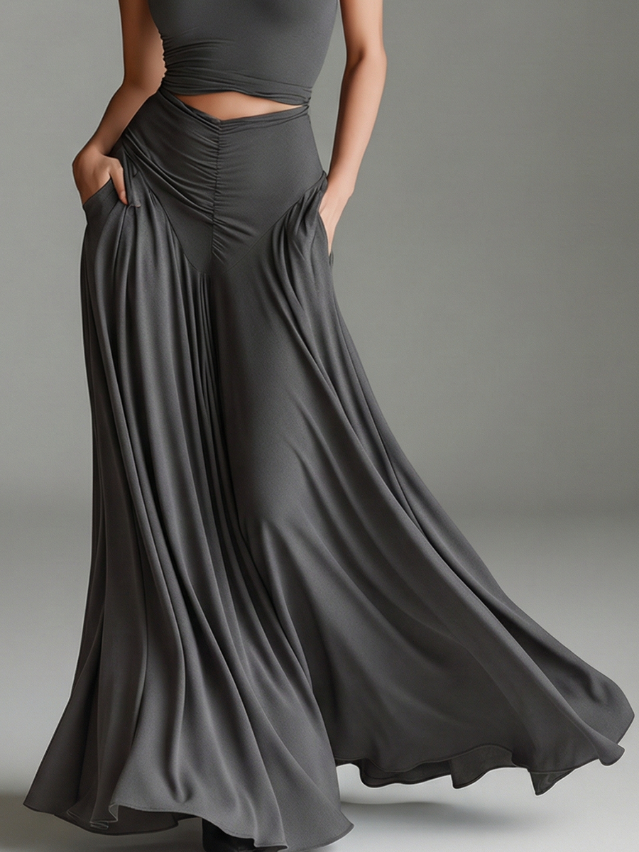 Sophisticated women's gray halter maxi dress, featuring a flattering cutout waist and ruched fabric, ideal for formal occasions.