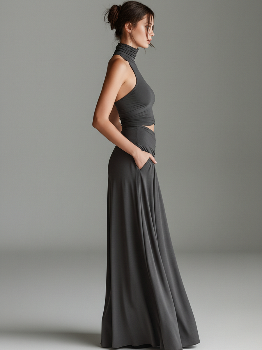 Stylish gray halter maxi dress for women, with an elegant cutout waist and ruched detailing, suitable for evening events.