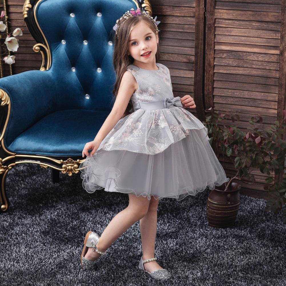 Girls' pink tulle princess ball gown, ideal for flower girl or holiday celebrations.