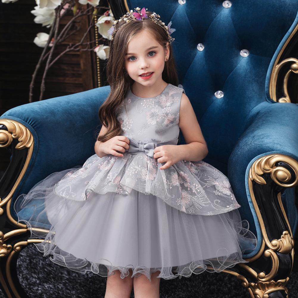 Close-up of the delicate tulle and embellishments on a girls' princess ball gown.