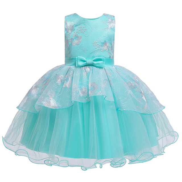 Back view of a girls' elegant tulle princess ball gown with intricate detailing.