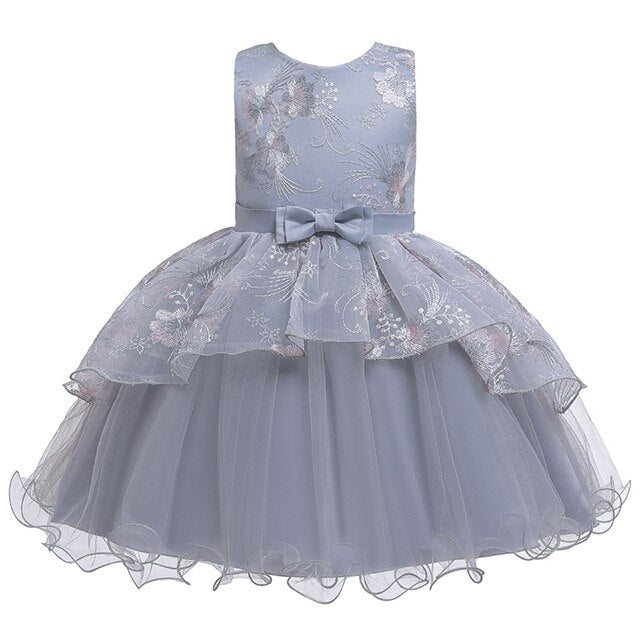 Collection of colorful tulle princess ball gowns for girls, perfect for any celebration.