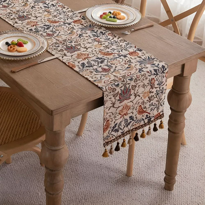 Decorative jacquard table runner with elegant floral & bird design for kitchen and dining areas.