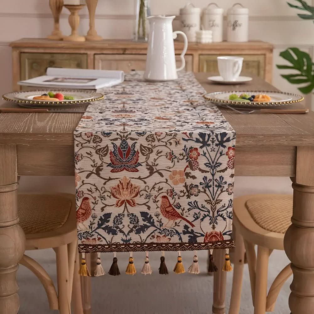 Luxurious jacquard table linen showcasing a beautiful floral and bird pattern, ideal for home decor.