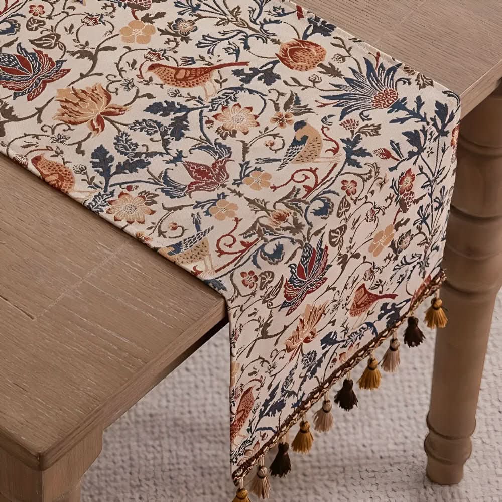 Stylish floral jacquard table runner with a charming bird motif, great for vintage-inspired spaces.
