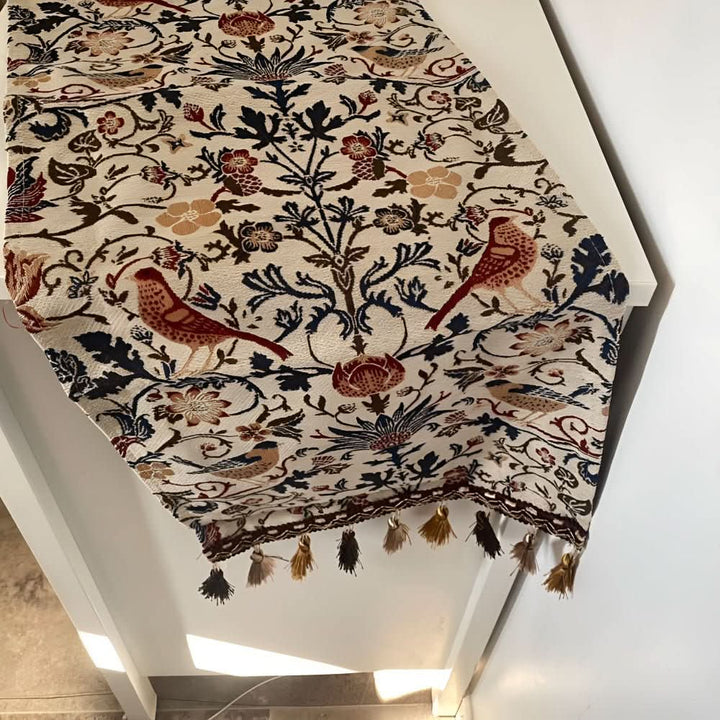 High-quality floral jacquard table runner with an elegant bird motif for a refined dining experience.
