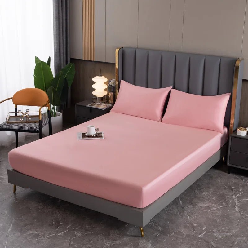 Elegant long-staple cotton fitted sheet with deep pocket, offering a snug and luxurious fit for your bed.