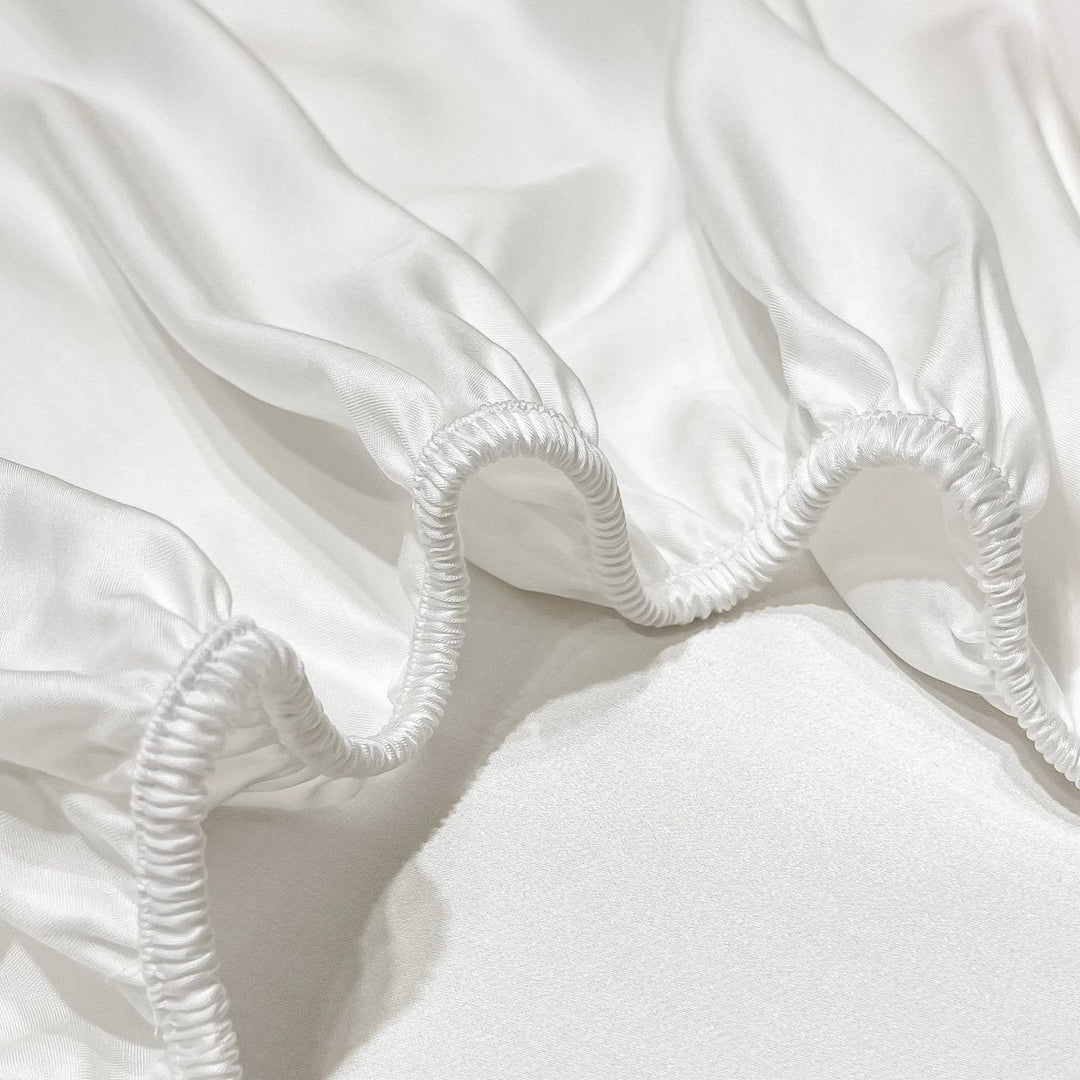 High-quality, durable long-staple cotton fitted sheet with a deep pocket, a luxurious and cozy bed linen choice.