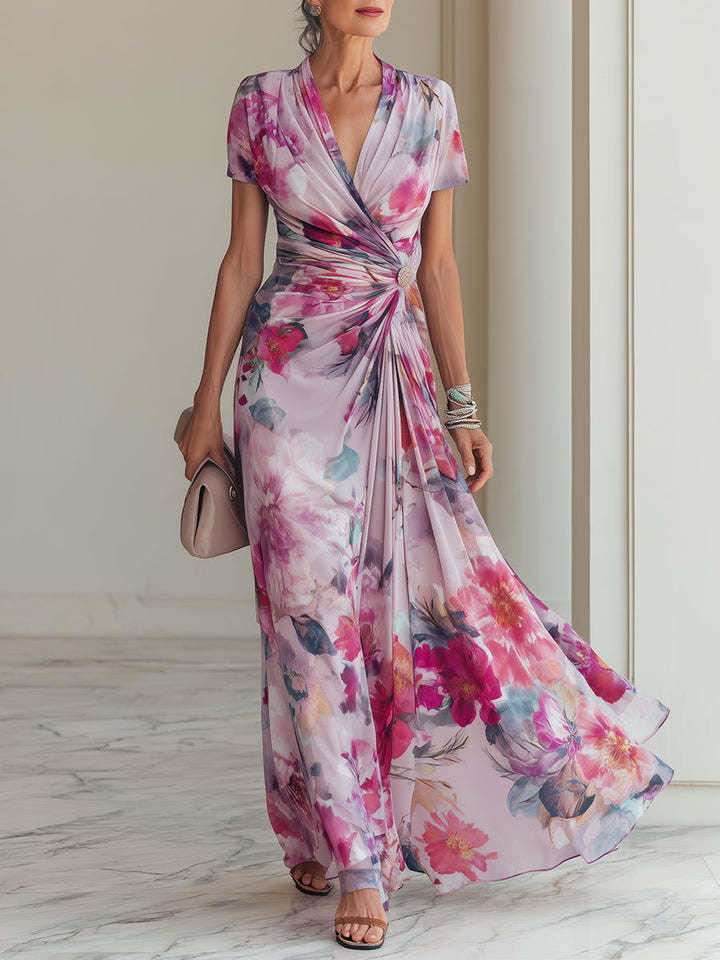 Elegant magenta floral wrap maxi dress for women, featuring a V-neck, short sleeves, and ruched waist for formal occasions.