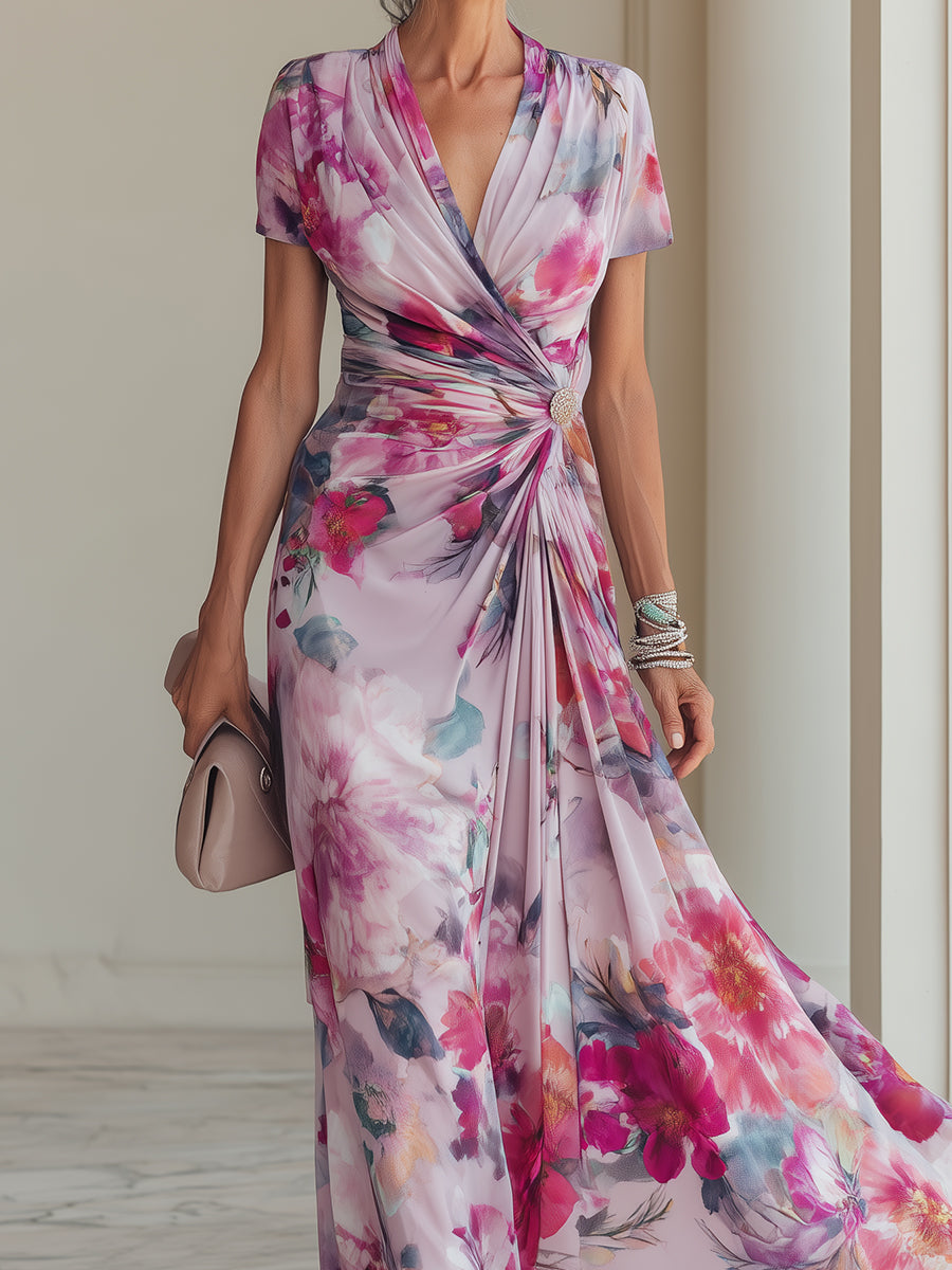 Women's floral wrap V-neck maxi dress in magenta with short sleeves and ruched waist, perfect for wedding guests.