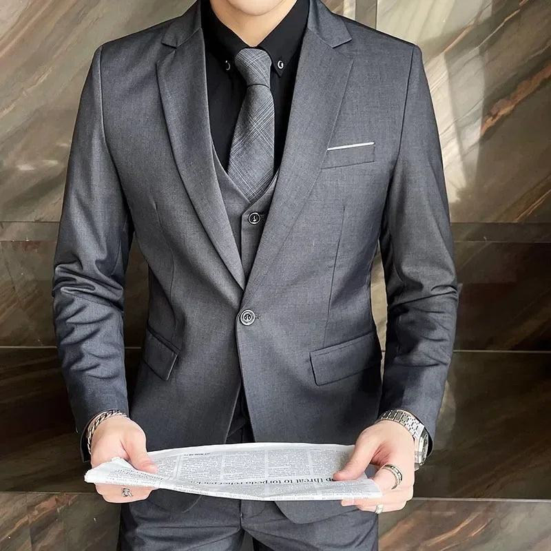 Modern men's slim fit 3-piece suit. Versatile formalwear for weddings, prom, or professional business outfits.