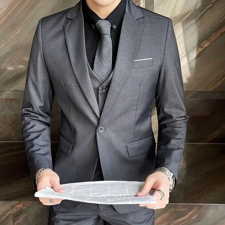 Modern men's slim fit 3-piece suit. Versatile formalwear for weddings, prom, or professional business outfits.