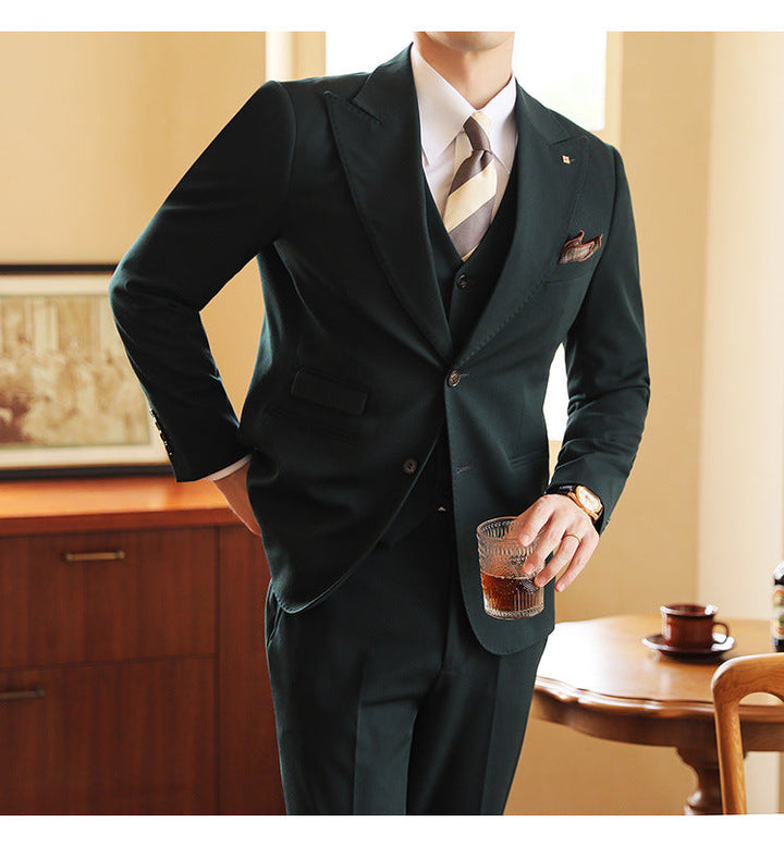 Sophisticated men's three-piece suit, a slim fit formal option for special events.