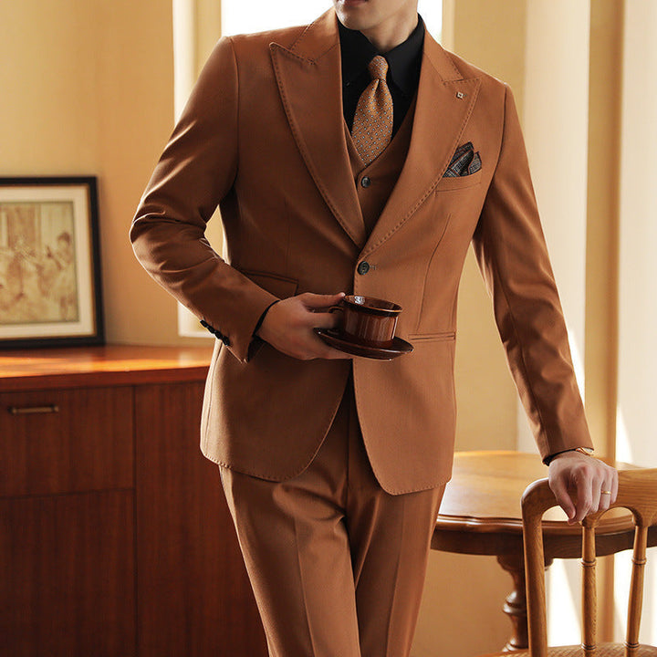 Green men's three-piece slim fit suit, perfect formal wear for weddings & events.