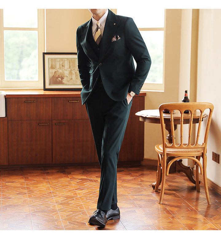 Stylish men's three-piece formal suit, tailored fit for modern gentlemen's fashion.