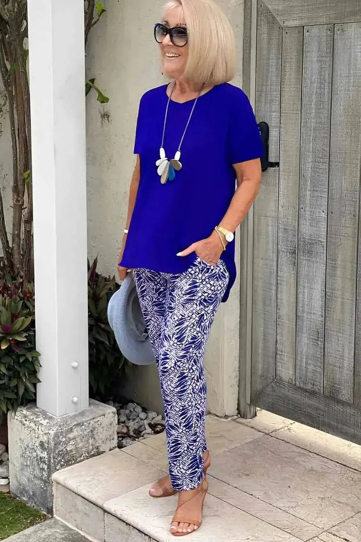 Women's comfortable navy blue patterned blouse, an elegant and stylish top for versatile fashion.