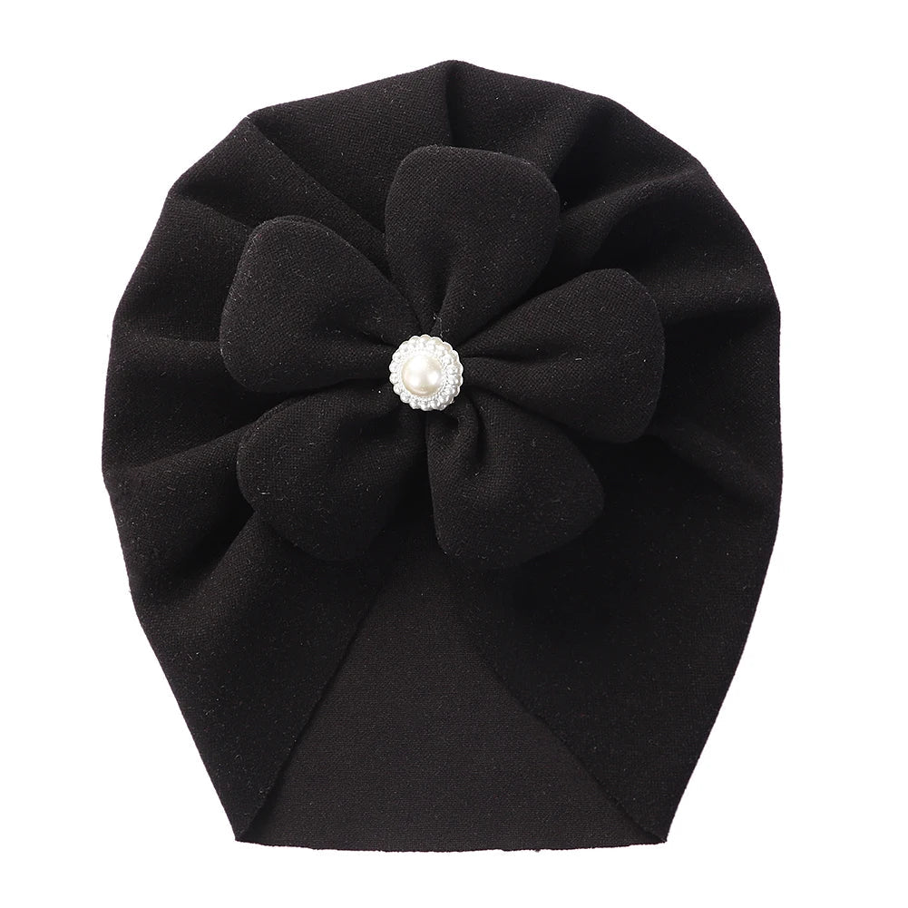 Stylish grey baby turban hat with a charming pearl embellishment, suitable for any baby.
