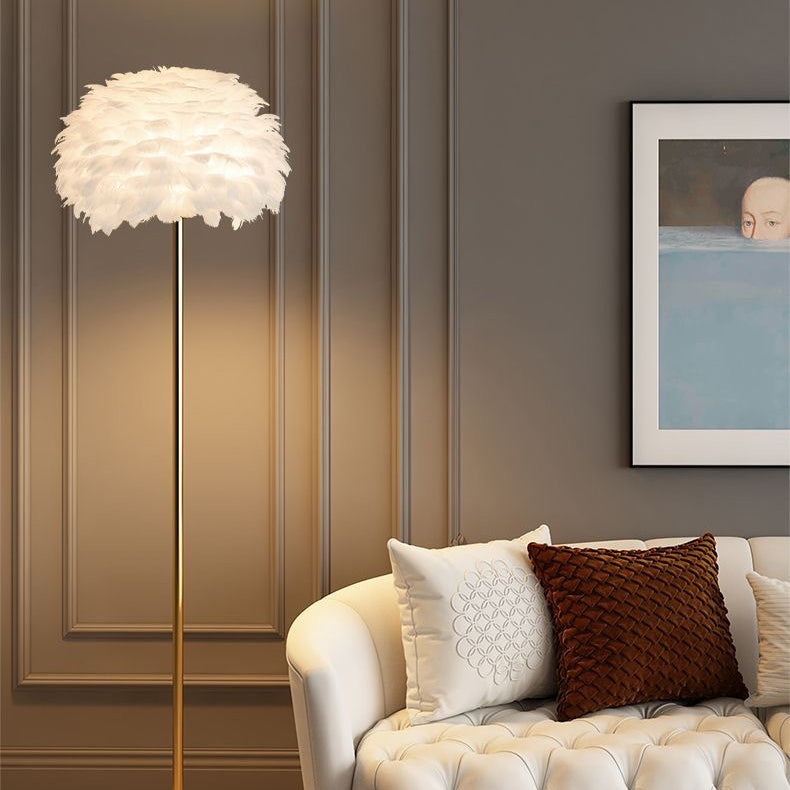 Elegant Nordic feather & crystal floor lamp for modern living room decor. Soft ambient light.