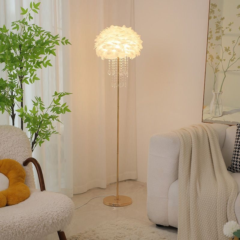 Luxurious feather and crystal floor lamp, perfect Nordic style lighting for bedroom accent.