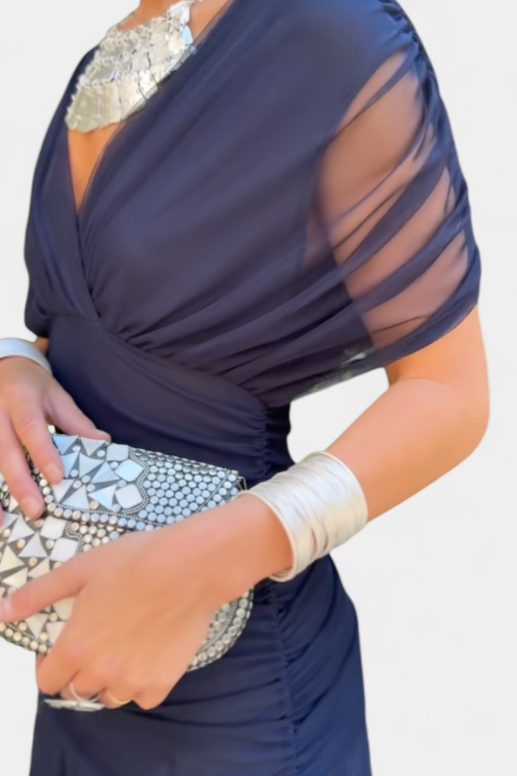 Special occasion off-shoulder maxi dress, a flowing draped design for women.