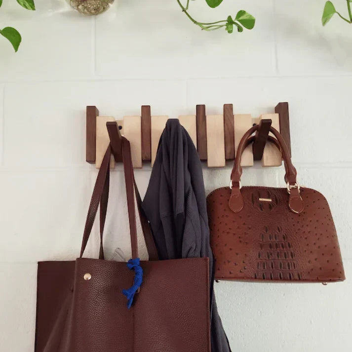 Unique musical piano coat rack with multiple hooks. Perfect hallway organizer, decorative storage, and home decor.