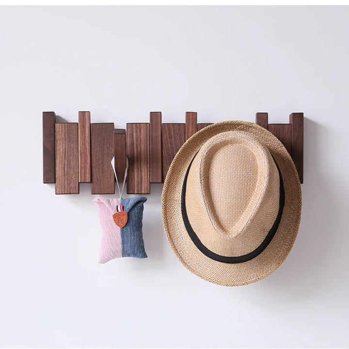 Space-saving piano wall hook rack. Stylish modern design for entryway organization, a unique piece of home decor.