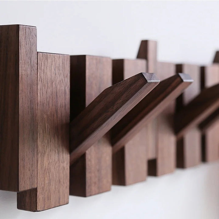 Unique piano design coat hanger. Decorative wall hook rack adding musical flair & modern storage to your home decor.