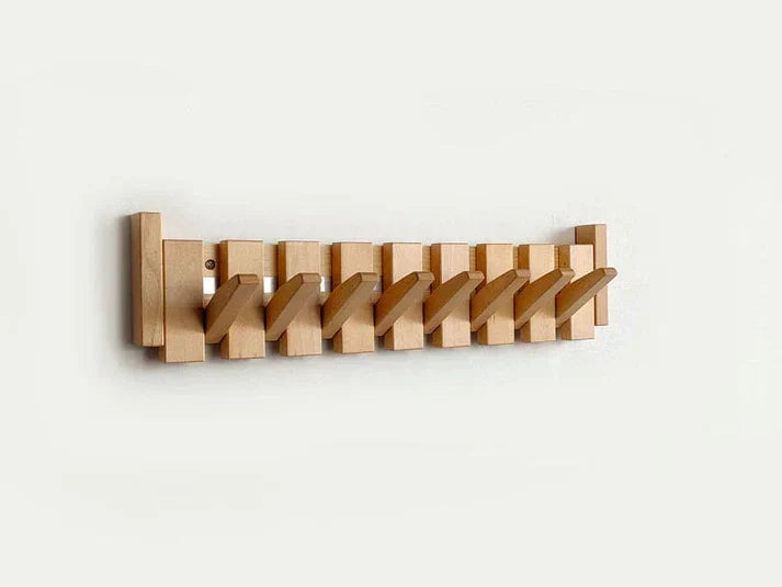Modern piano coat rack for hallway organization. Space-saving wall hooks with an elegant musical theme for entryways.
