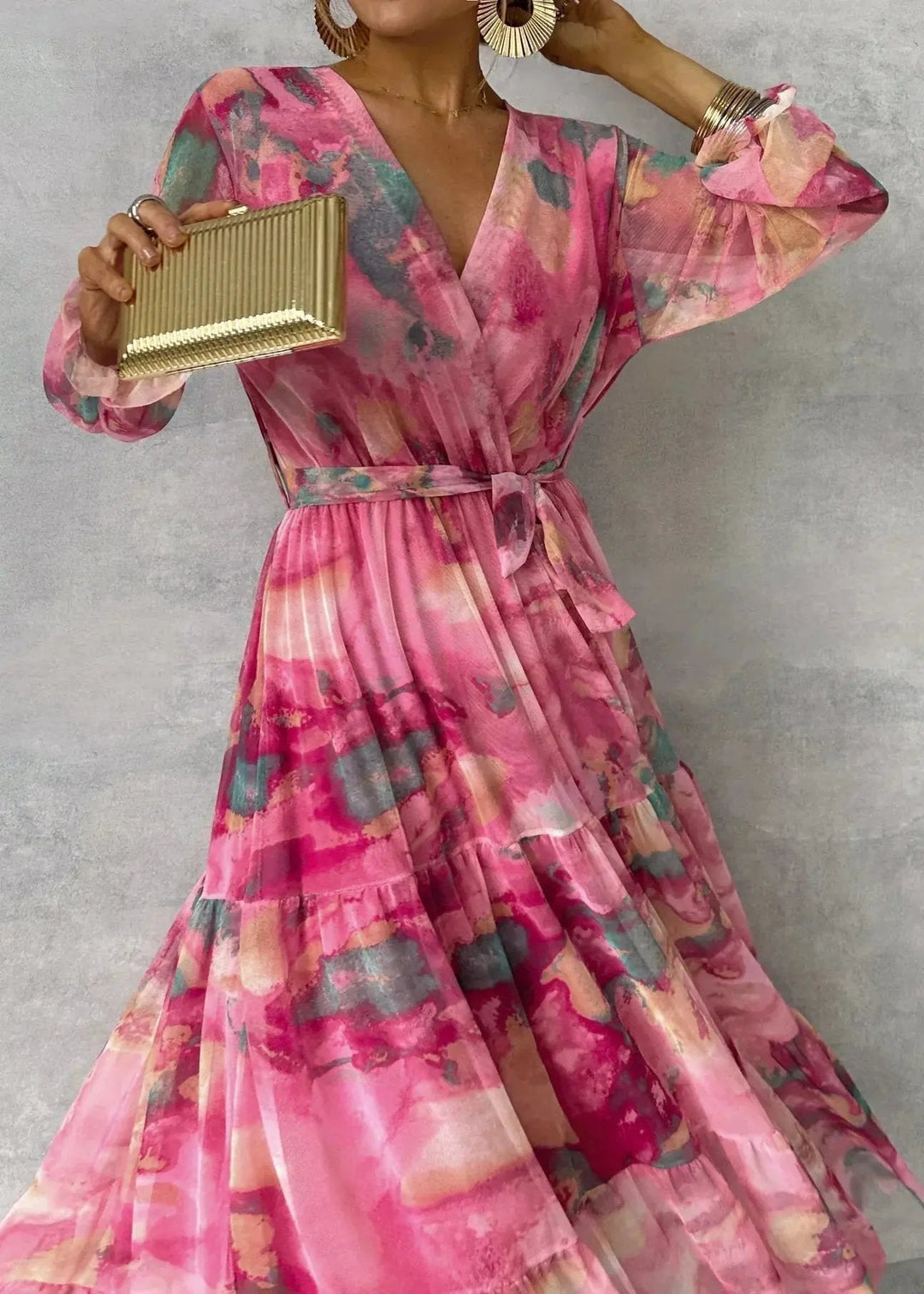 Effortless casual or elegant pink V-neck belted wrap midi dress, a versatile spring fashion statement.