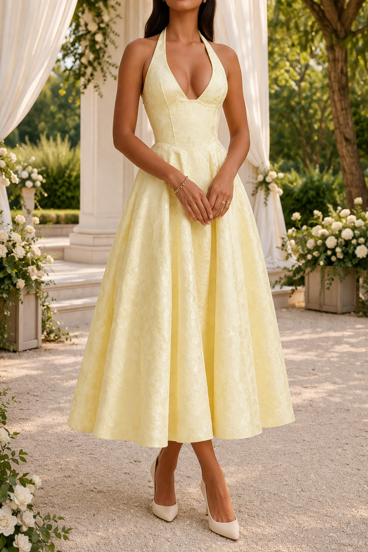Stylish yellow women's midi dress featuring a halter neck and elegant flared skirt, suitable for special events.