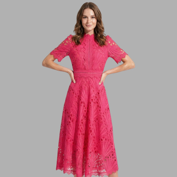 Elegant pink women's lace midi dress with short sleeves & high neck, perfect for formal evening or cocktail occasions.