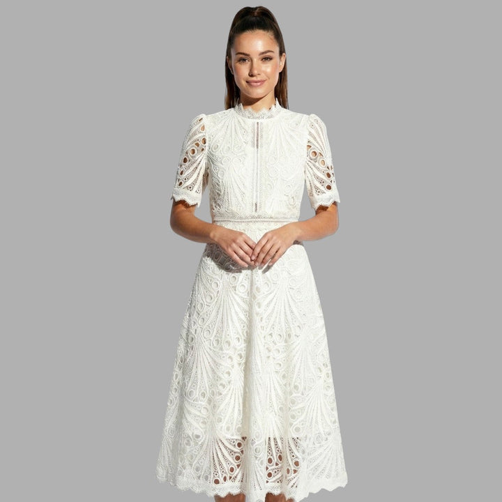 Sophisticated white women's lace midi dress, high neck & short sleeve, ideal for formal events, evening parties.