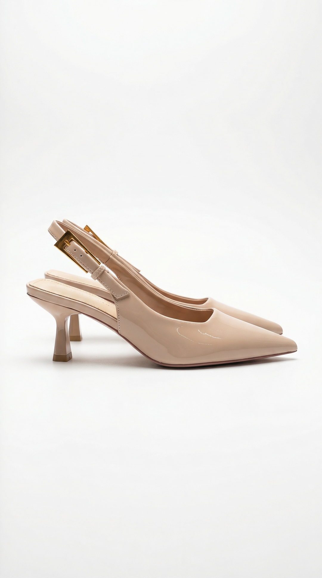 Classic women's pointed toe slingback pumps with a comfortable kitten heel for elegant wear.